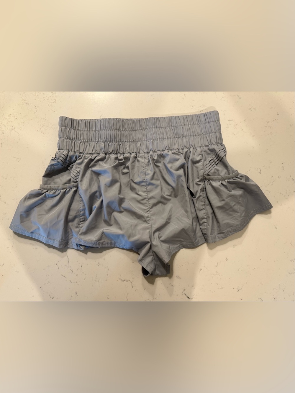 FP Movement Get Your Flirt On Ruffle Running Shorts Gray SP - Picture 5 of 8